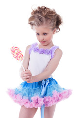 Pretty little girl with lollipop