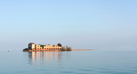 abandoned house in the sea