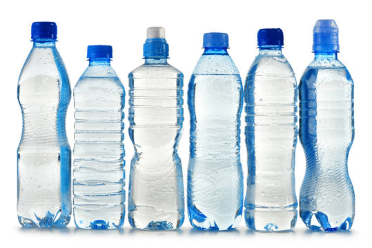Plastic bottles of mineral water isolated on white