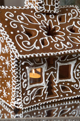fragment of Homemade gingerbread house and christmas spices