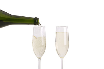 two glasses and a bottle of champagne