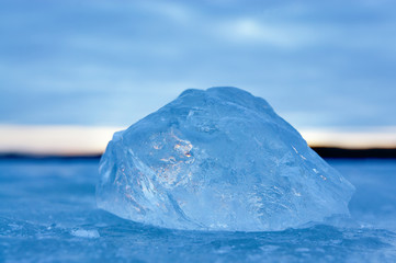 piece of ice on frozen lake