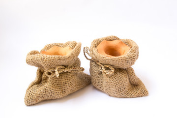 burlap sack clay pots