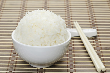 White steamed rice in ceramic bowl