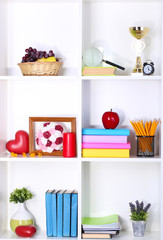 Beautiful white shelves with different home related objects