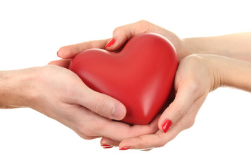 Fototapeta na wymiar Red heart in woman and man hands, isolated on white