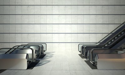 Moving escalator and empty wall in modern building