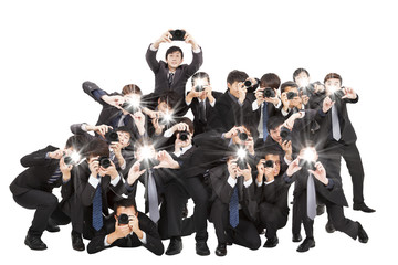 many photograper holding camera pointing to you and isolated on - obrazy, fototapety, plakaty