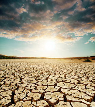 global warming. dramatic sky over cracked earth © Mykola Mazuryk