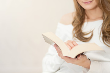 Woman reading book and relaxing