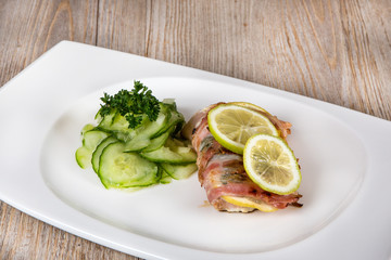 Fresh grilled salmon wrapped with bacon