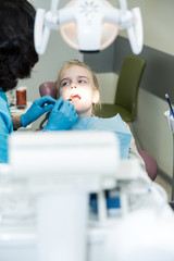 brave girl in dental office