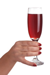 A glass of wine in a female hand
