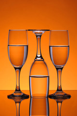 Contrariwise glasses on mirror