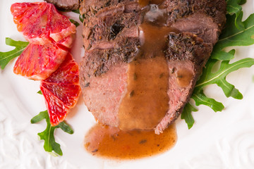 crunchy duck's breast with orange and rucola