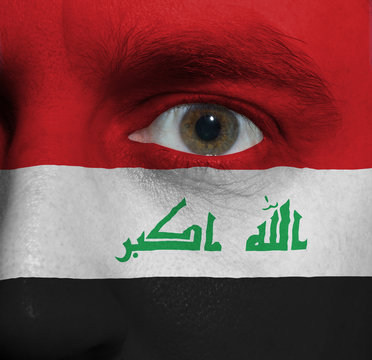 face with the Iraqi flag painted on it