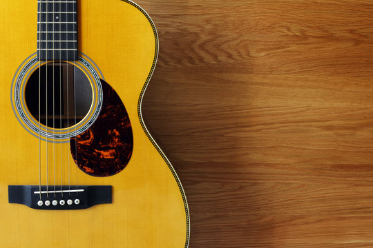 Guitar and wood background