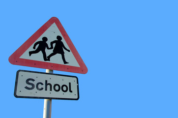 old school sign on blue sky background