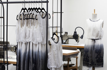At dressmaker's work
