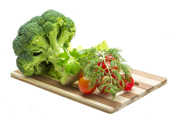 Obraz na płótnie Canvas Brokoli i pomidor