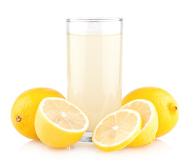 Glass of lemon juice with lemons