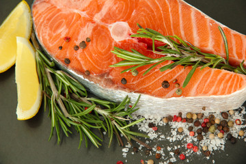 Fresh salmon steak on pan, close up