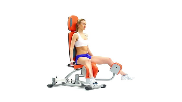 Blonde young woman on isodynamic exerciser