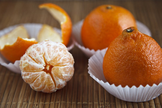 The Peeled Tangerine And Tangerines In A Skin