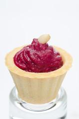 tartlet with beetroot mousse and goat cheese closeup