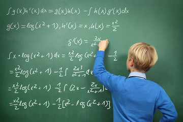Schoolboy at the Blackboard with Formulas