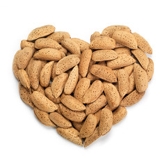 Almonds heart. Health concept.
