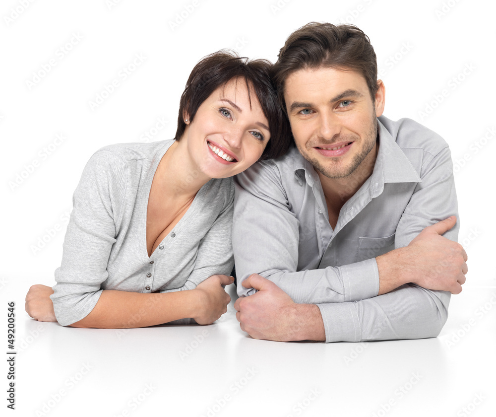 Wall mural Portrait of happy couple isolated on white