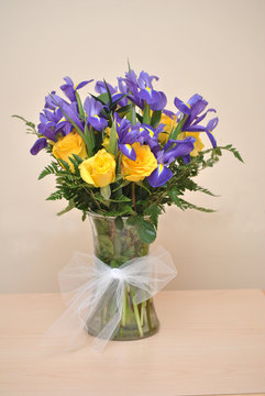 Vase of Yellow Roses and Purple Irises