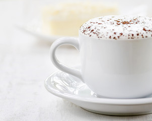 Cup of coffee and fresh cake