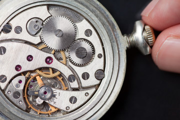 Winding up old clock mechanism