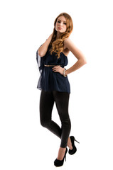 Beautiful blonde young lady posing in studio