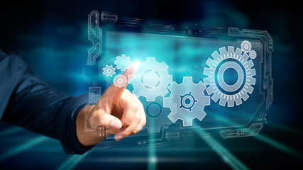 Finger drückt auf Zahnrad