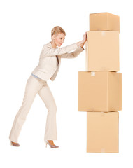 businesswoman with big boxes