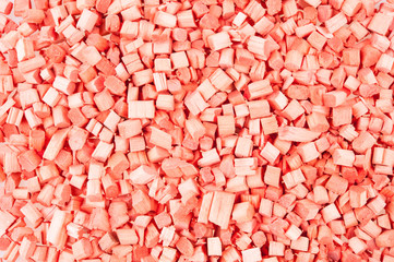 Orange background pieces of wood, closeup