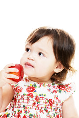 Child tastes apple