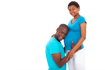 loving young african american couple expecting baby