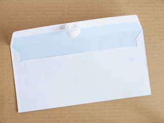 white envelope on cardboard