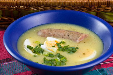 traditional polish white borscht with eggs and sausage