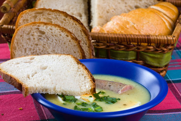 traditional polish white borscht with eggs and sausage