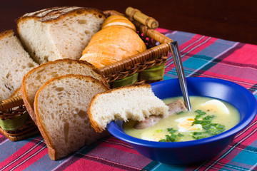 White borscht with eggs and white sausage