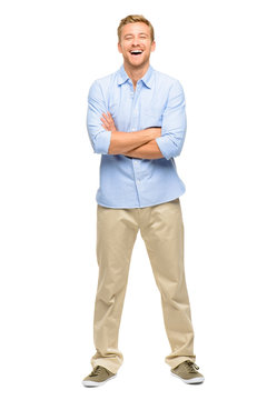Handsome young man arms folded full length white background