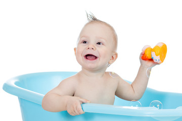 baby kid taking bath and playing