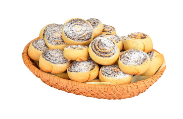 Cookie roll with poppy in a wattled basket, isolated on white