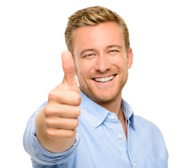 Happy man thumbs up sign full length portrait on white backgroun