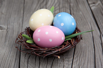 Colorful easter eggs in a nest